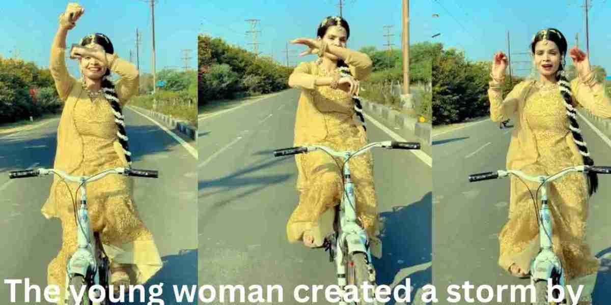 The young woman created a storm by dancing to the rhythm of the song and dancing on a bicycle