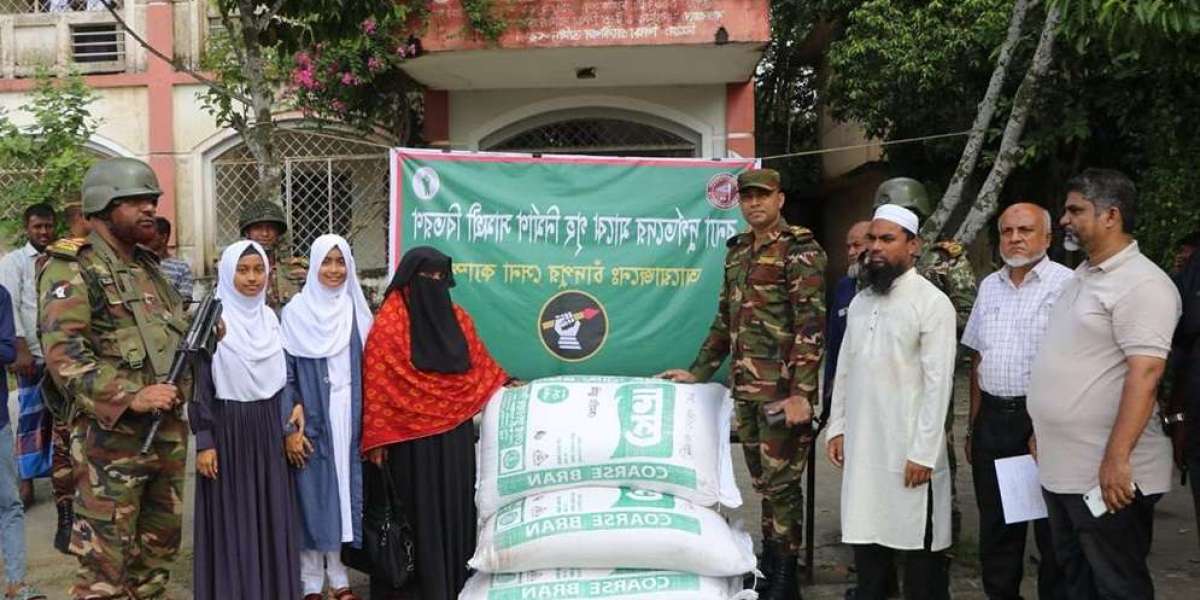 Distribution of house building material-cash among flood victims in Shahrasti