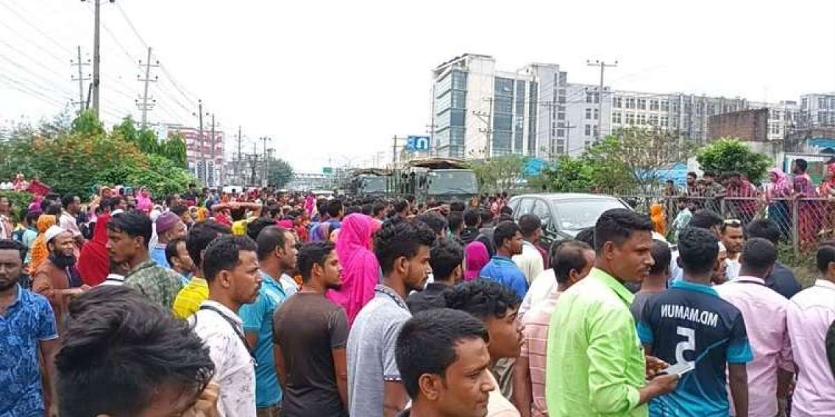 Workers protest by blocking Chandra-Navinagar road in Gazipur