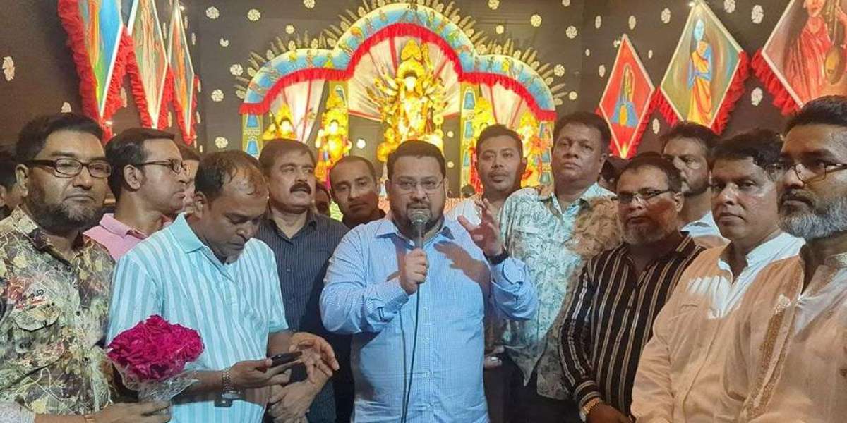 BNP leader Barrister Mir Mohammad Helal visited the puja