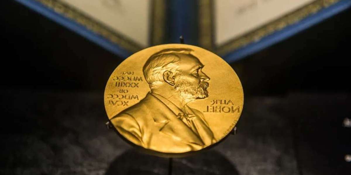 Nobel Prize gold medal contains what text and picture