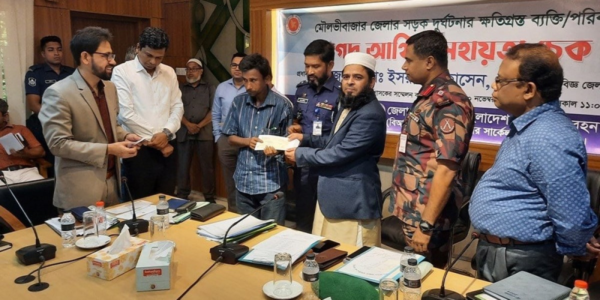 A check of Tk 45 lakh was given to the families of those killed in the road accident